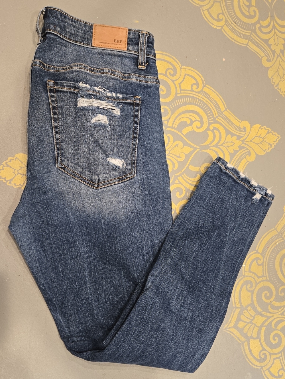 BKE Women's Distressed Medium Blue Ankle Skinny Jeans